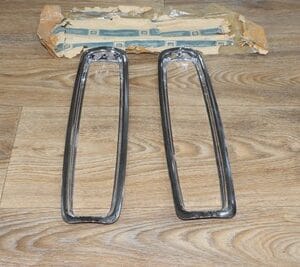 NOS GM 1617296 Pair Cadillac Fleetwood Deville RWD Tail Lamp Light Bezel 80 - 89