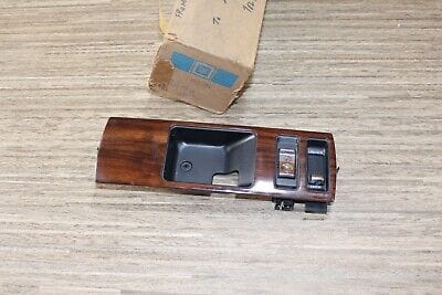 NOS GM 10242034 bezel front side door inside handle (woodgrain) Chevrolet 91-96 NOS GM 10242034 bezel front side door inside handle (woodgrain) Chevrolet 91-96