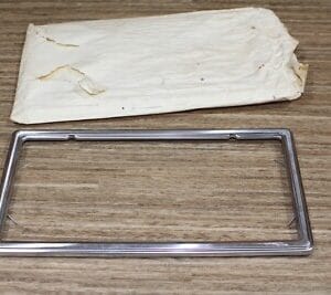 NOS GM 63-82 Corvette License Plate Frame / Bezel - Clip-On Stainless Steel