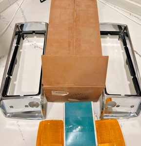 NOS GM OEM Chevrolet Caprice Head Light Chrome Bezel W/ Lens 1986 Left and Right