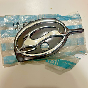 NOS 1994-1996  CHEVY IMPALA SS TRUNK LOCK EMBLEM Cherry Color 12524203