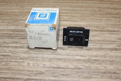 NOS GM 14040843 1985 1991 CHEVROLET SUBURBAN REAR DEFOG DEFROST SWITCH BEZEL NOS GM 14040843 1985 1991 CHEVROLET SUBURBAN REAR DEFOG DEFROST SWITCH BEZEL