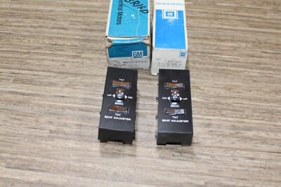 NOS GM 20731009-31010 switch mod seat adjust switch armrest LH-RH Olds Cadillac NOS GM 20731009-31010 switch mod seat adjust switch armrest LH-RH Olds Cadillac