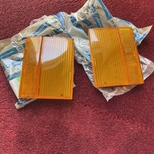 NOS GM Oldsmobile 98 Delta 88 Side Lamp Lens Markers 1980 - 1984 PAIR
