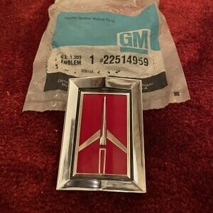 NEW Oldsmobile Delta 88 Royale Grille Chrome Header Panel Ornament Emblem NOS