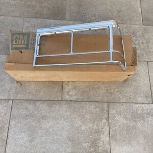 NOS GM 1980-89 Cadillac HEADLIGHT BEZEL Fleetwood Brougham LH Trim